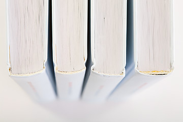 Image showing Backs of four books