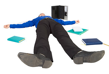 Image showing Businessman lies on a floor among the things