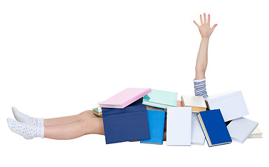 Image showing Schoolgirl heap up with books