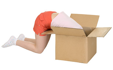 Image showing Young girl in cardboard box