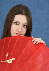 Image showing Portrait of girl with a red umbrella