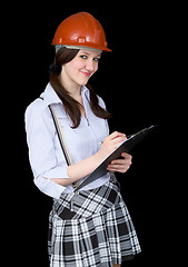 Image showing Girl in a helmet with a tablet in hands