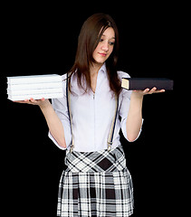 Image showing Schoolgirl with books in hands