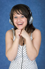 Image showing Happy girl in ear-phones