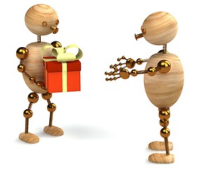 Image showing Wood man with gift box