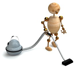 Image showing wood man with a vacuum cleaner