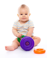 Image showing Little boy play with toys