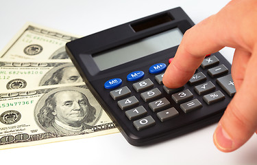 Image showing Calculator and money - accounting concept