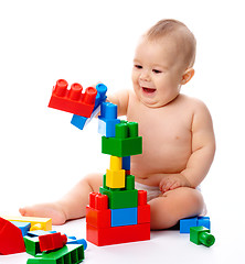 Image showing Little boy with building bricks