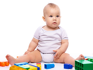 Image showing Little boy with building bricks