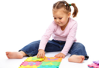 Image showing Little girl with alphabet