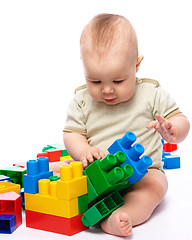 Image showing Little boy with building bricks