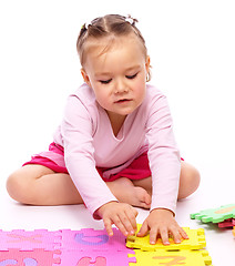 Image showing Little girl with alphabet