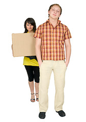 Image showing Woman and man bear the big cardboard box