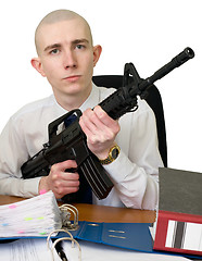 Image showing Accountant with a rifle in hands