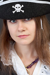 Image showing Portrait of serious pirate woman in hat close-up