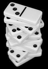 Image showing Pile from dominoes on black background