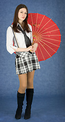 Image showing Young woman with the Japanese umbrella in a hands