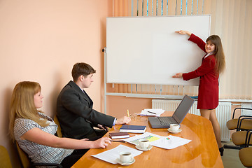 Image showing Young woman to speak at a meeting