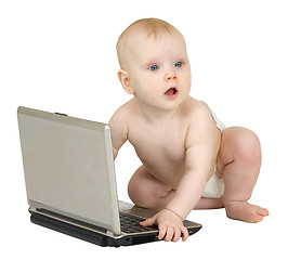 Image showing Baby with the laptop on white