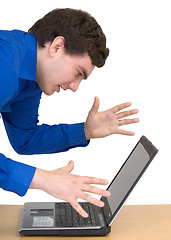 Image showing Man emotionally communicates with the laptop