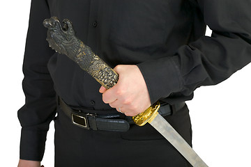 Image showing Chinese sword in a hand at the man