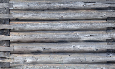 Image showing Old grey timbered wall of framework