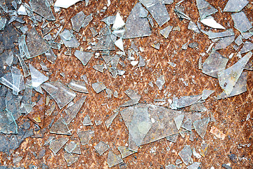 Image showing Rusty old metal floor and glass