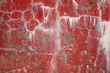 Image showing Red dirty cracked wall background with stains