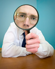 Image showing Funny people with a magnifier