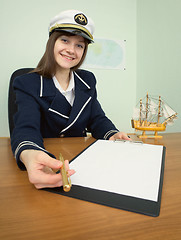 Image showing Woman - captain suggests us to sign document