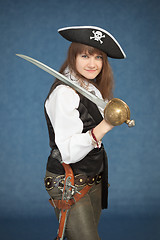 Image showing Pirate girl with sword on blue