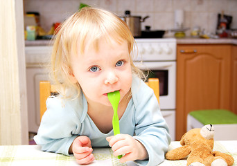 Image showing Child with a spoon