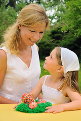 Image showing Young mother and daughter having Easter time