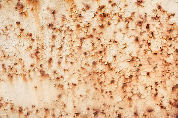 Image showing Rusty iron sheet with the peeled paint and corrosion stains