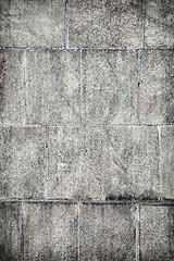 Image showing Surface of old concrete wall covered with grey plates