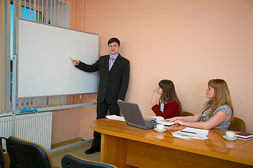 Image showing Young man to speak at a meeting