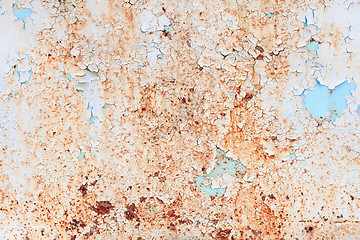 Image showing Weathered surface of a steel sheet with paint scraps