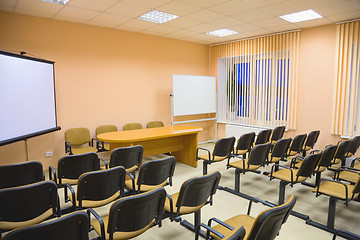 Image showing Modern interior of a conference hall in pink tones