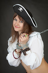 Image showing Young sexy girl in a costume pirate chained in a chain