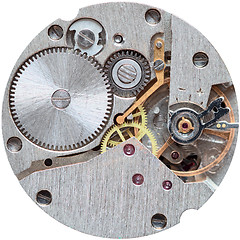 Image showing Old clockwork it is isolated on a white background