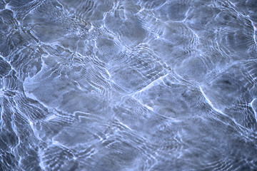 Image showing Abstract violet background by sunlight on water surface