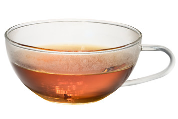 Image showing Transparent glass cup with tea on white background