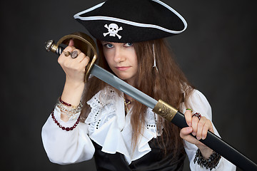 Image showing Portrait of woman in pirate hat with sabre in hands