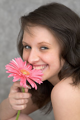 Image showing Portrait of the beautiful girl with flower chrysanthemum