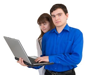 Image showing Young pair with the laptop