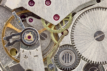 Image showing Ancient tiny clockwork close up background