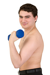 Image showing Young guy is engaged in gymnastics on white background