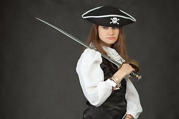 Image showing Portrait of sad girl in costume of pirate with sabre