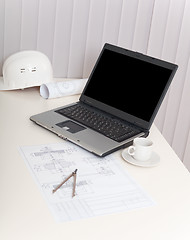 Image showing Workplace of engineer with laptop